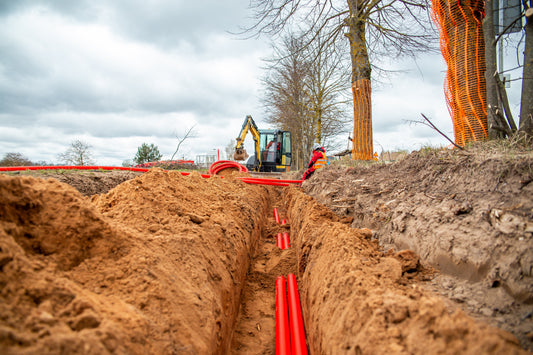 Dig, Place, Repeat: How Excavators Power Utility & Telecom Work