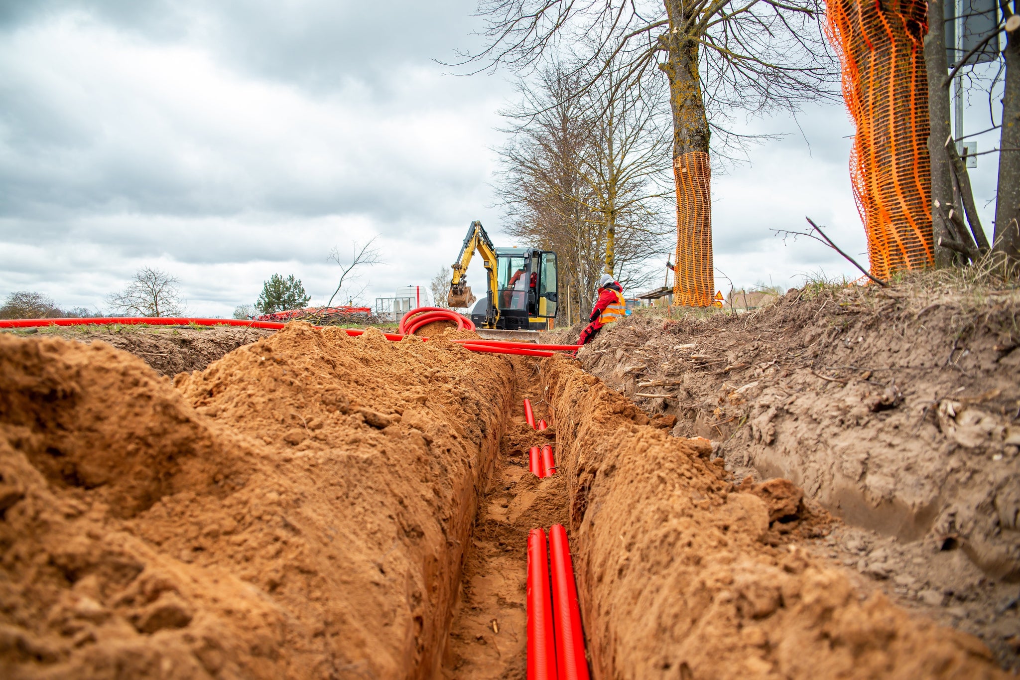 Dig, Place, Repeat: How Excavators Power Utility & Telecom Work